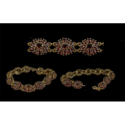 46 - 18ct Gold Orange Garnet Set Bracelet, well designed and of excellent quality, marked 750 - 18ct; the... 