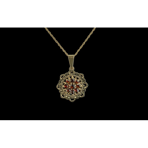 484 - Ladies 9ct Gold - Garnet Set Cluster Pendant with 9ct Gold Attached Chain. Both Pendant and Chain Ma... 