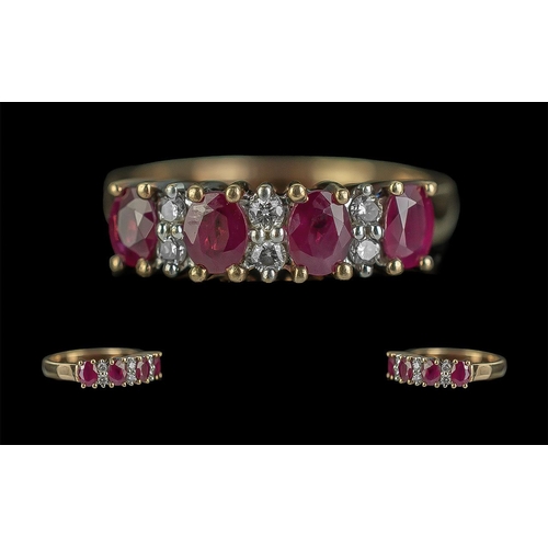 53A - Ladies 18ct Gold Ruby and Diamond Set Ring. Full Hallmark to Shank. The Four Rubies of Excellent Col... 