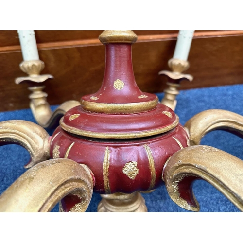 1018 - Two Wooden Chandeliers, painted in burgundy and gilt. Five branch with candle lights, circa 1920's. ... 