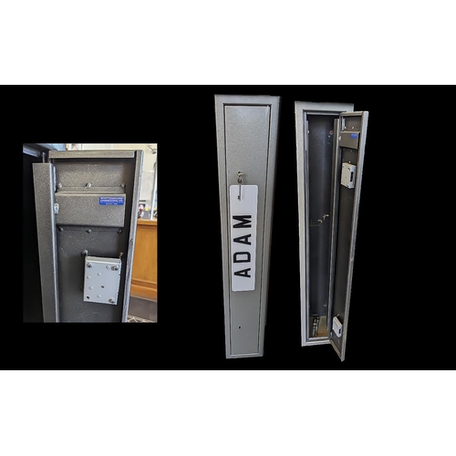 1043 - A Gun Safe/Cabinet Complete with keys and mounts, height 51.5'' x 8.75'' x 8''.