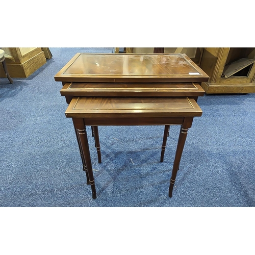 1059 - Nest of Three Tables, rectangular form, tallest 21'' high x 23'' wide x 15'' deep, raised on turned ... 