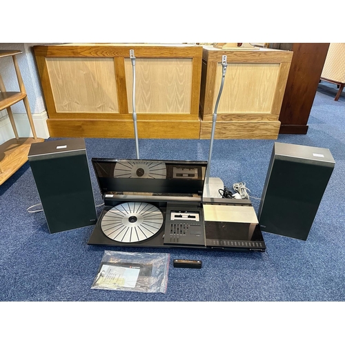 1063 - Bang & Olufson Beocenter 2200, complete with record deck, casette, radio, two x B & O Speakers, spar... 