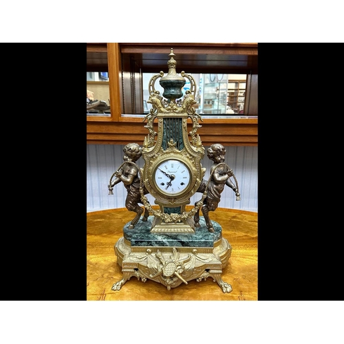 1110 - Louis XV Style Brass Clock, white dial with Roman numerals, marked Imperial, made in Italy.  Lyre sh... 