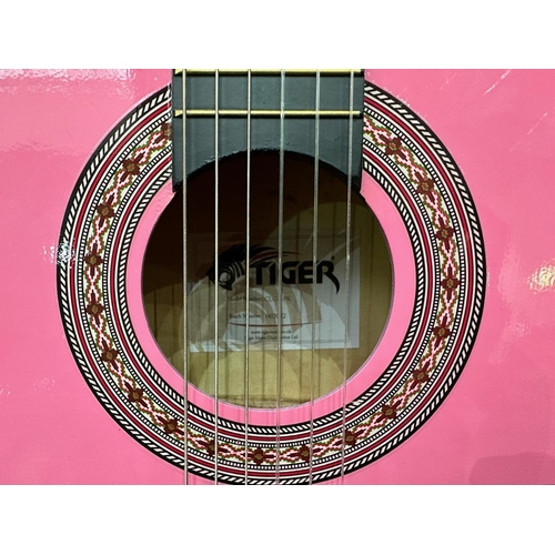 1125 - Pink Acoustic Tiger Guitar, Model No. CLG4-PK.  With shoulder strap and fitted soft case.