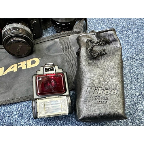 1169 - Nikon N90 Camera in case, together with a Vanguard tripod and a Tamron 300 Adaptall Lens.