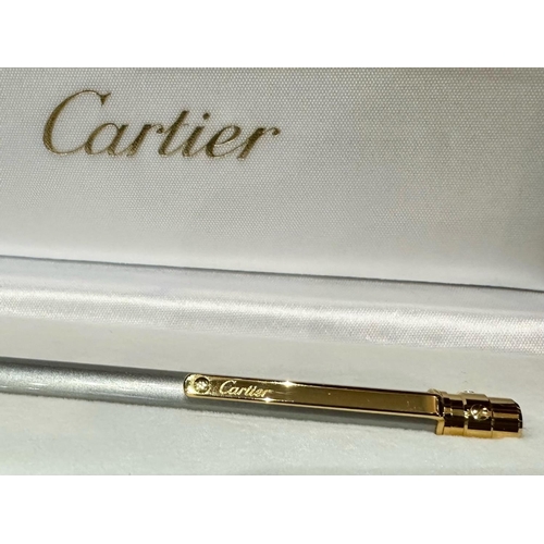 1354 - Cartier Ball Point Pen, silver tone with gilt clip and fittings.  Marked Cartier, serial No. A105417... 