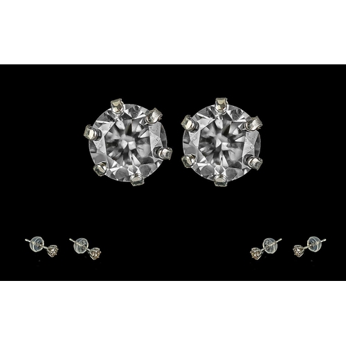 218 - Pair of 18ct White Gold 6-claw Set Diamond Solitaire studs with rubber-capped butterflies, boxed. Ro... 