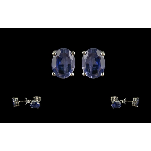 486 - Pair of Iolite studs in silver.