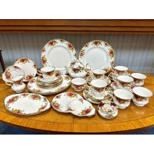 589 - Royal Albert 'Old Country Roses' Tea Set, comprising Tea Pot, milk jug, sugar bowl, six cups, eight ... 