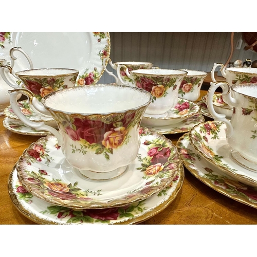 589 - Royal Albert 'Old Country Roses' Tea Set, comprising Tea Pot, milk jug, sugar bowl, six cups, eight ... 