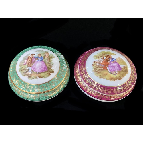 606 - Limoges of France - Two Lidded Trinket Bowls, decorated with classical figures of courting couples, ... 