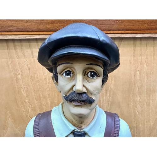 653 - Fibreglass Statue of a 1930's Golfer with Club, display model, measures 25.5'' high x 95'' wide x 8'... 