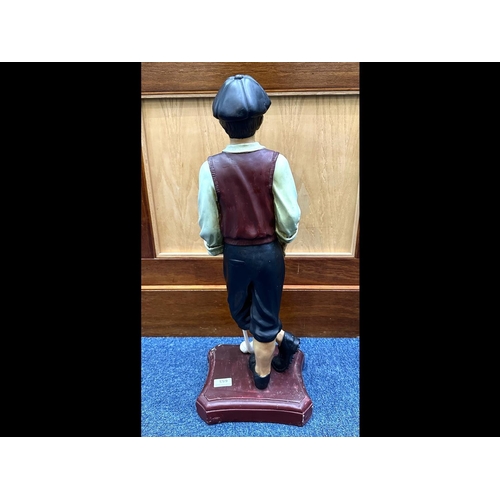 653 - Fibreglass Statue of a 1930's Golfer with Club, display model, measures 25.5'' high x 95'' wide x 8'... 