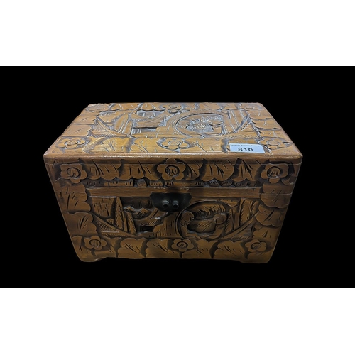 810 - A Small Oriental Wooden Camphor Box, carved throughout, 12'' x 7.5''.