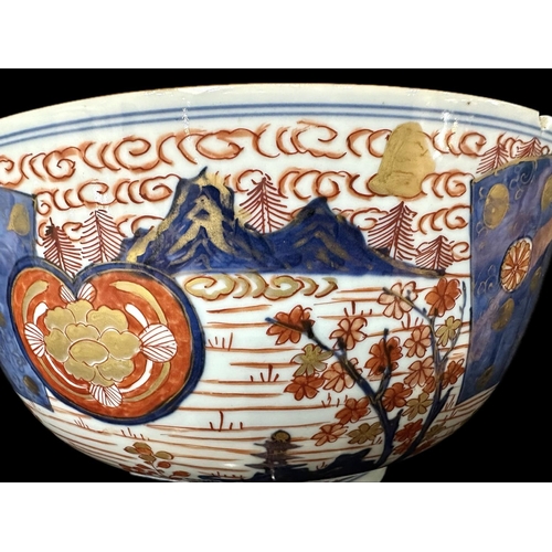 815 - A Chinese Imari Punch Bowl, repaired break to edge, stapled, 12'' diameter x 6'' tall.