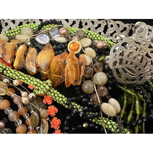 480A - Bag of Costume Jewellery. Amber, Silver Necklace In Pouch, Glass Beads, Jet, Necklaces etc.