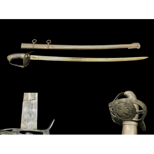 1316 - German Sword & Scabbard with hand guard with dragon motif. Overall length 38''.