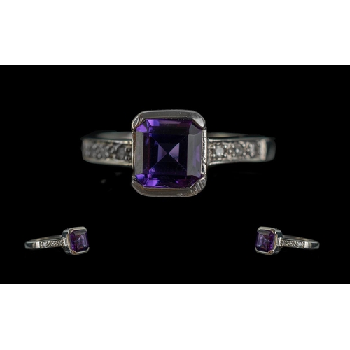 142A - White Gold Amethyst & Diamond Set Dress Ring, the square cut amethyst set with small diamond shoulde... 