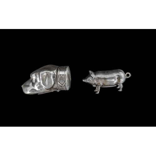 144A - Two Silver Vesta Cases, modelled in the form of a pig and a dog's head.