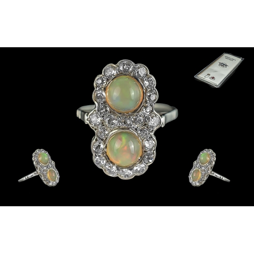 186A - Certificated Unusual 18ct White Gold Victorian Ring set with 2 cabochon opals and several old Europe... 