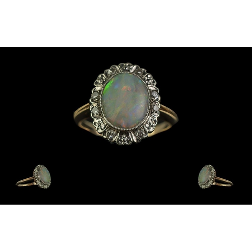 30 - Ladies 18ct Gold Attractive Opal and Diamond Set Cluster Ring. The Central Large Opal of Good Colour... 