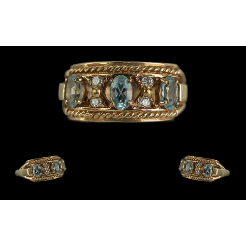 38 - Ladies Attractive 9ct Gold Aquamarines and Diamond Set Ring. Full Hallmark to Interior of Shank. The... 