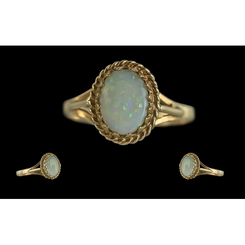 66 - Ladies Attractive 9ct Gold Single Stone Opal Set Ring full hallmark to interior of shank the opal of... 