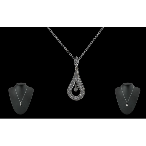 15A - Ladies - Excellent 18ct White Gold Diamond Set Pendant Attached to a 18ct White Gold Chain. The 24 R... 