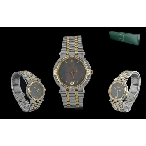 178 - Gucci Ladies Pleasing Steel and Gold Tone Quartz Wrist Watch featuring black dial, Gucci display box... 