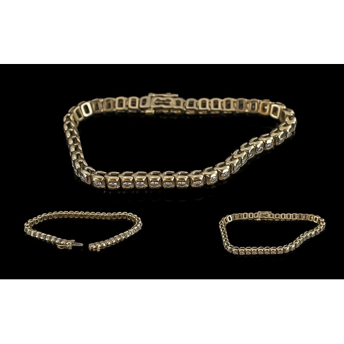 27 - 14ct Gold - Attractive Diamond Set Tennis Bracelet. Marked 14ct, Set with Well Matched Diamonds, Wel... 