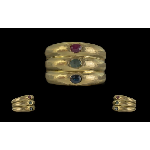 35 - 18ct Gold Trilogy Banded Gem Set Ring. Set with Blue Sapphire Emerald and Ruby all of Good Colour. M... 