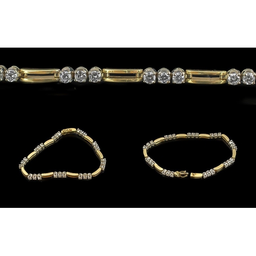 5A - 18ct Gold Pleasing Quality Diamond Set Line Bracelet. Marked 750 - 18ct. Set with 27 Well Matched Sm... 