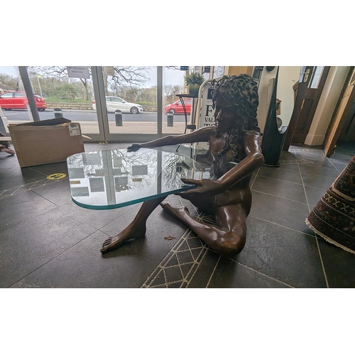 1043 - Jonathan Wylder Patinated Bronze Naked Female Figure Table with glass top, depicts a naked lady sitt... 