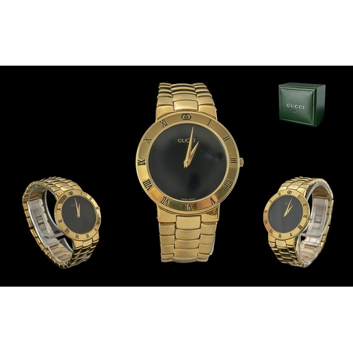 158 - Gucci - Expensive Looking Gents or Ladies Gold Plated Wrist Watch with Signed Black Dial, Gold Marke... 