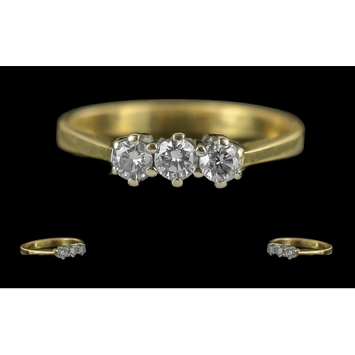 339 - Ladies Pleasing 18ct Gold 3 Stone Diamond Set Ring - Marked 750 (18ct) to Interior Of Shank. The wel... 