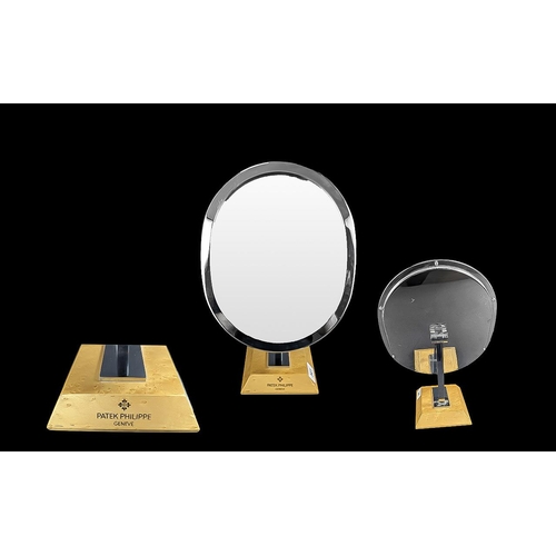 341 - Patek Philippe Geneve Desk Top Oval Mirror on maple wood base, chrome plated framed mirror, engraved... 