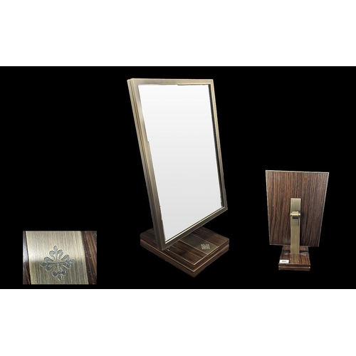 342 - Patek Philippe Geneve Desk Top Rectangular Mirror on rosewood base, framed in rosewood, Patek Philip... 