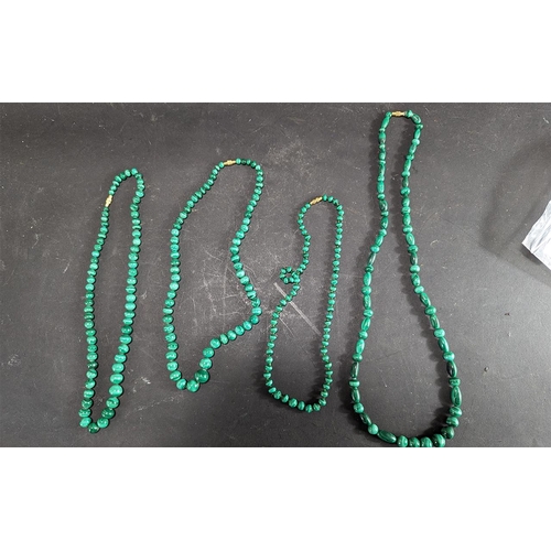 425 - Four Strings of Malachite Beads, 3 x 20'' length and 1 x 28''.