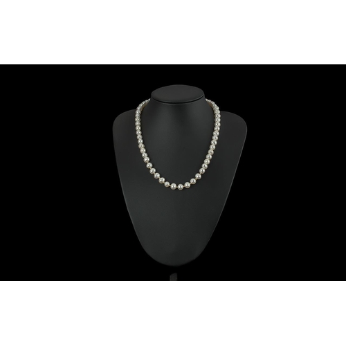 458 - Single Strand Pearl Necklace with 9ct gold clasp, bottom ten pearls with gold spacers between.  18''... 