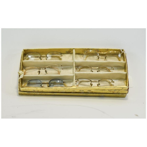 478A - Box Containing A Collection Of Mid 20thC Spectacles, Various Designs.