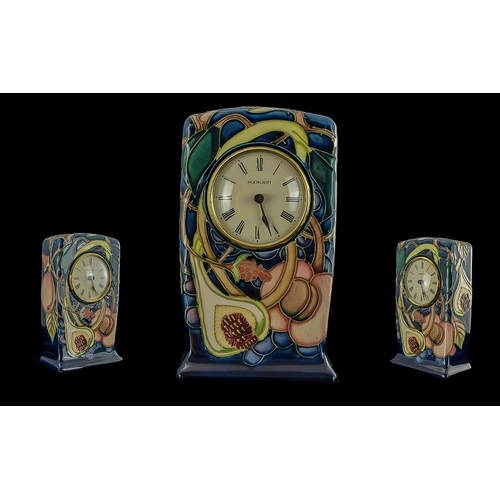 539 - Moorcroft Mantle Clock, marked to base Moorcroft and 2000, pomegranate pattern.  Moorcroft Pottery C... 