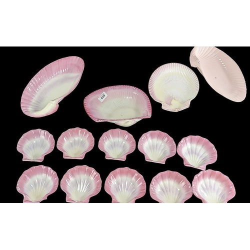 639 - Wedgwood Pink Shell Serving Dish with 10 matching oyster shell dishes, together with three large she... 