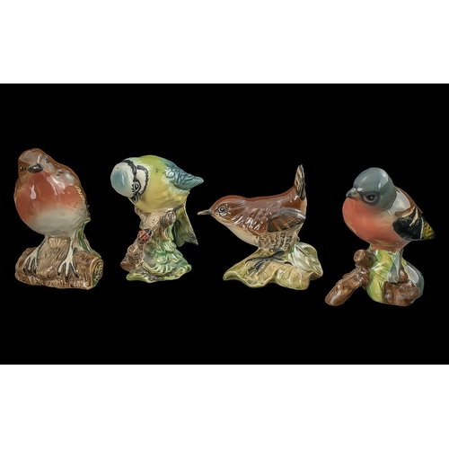 656 - Four Beswick Birds, comprising Robin 980, Blue Tit 992, Wren 993, and Chaffinch 991.