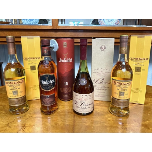 1387 - Four Bottles of Single Malt Whisky, two bottles of Glenmorangie 10 years old, Balvenie 10 years old,... 