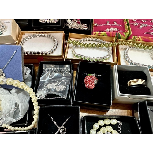 455 - Large Box of Costume Jewellery, boxed and as new, mostly Avon, including chains, necklaces, beaded b... 