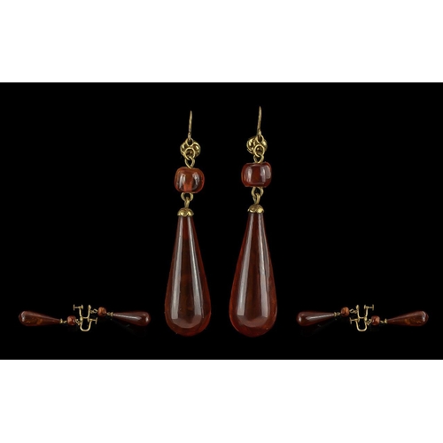 102 - Ladies Fine Quality Pair of 14ct Gold Tear Drop Amber Set Earrings. marked 14ct to each earrings. c.... 