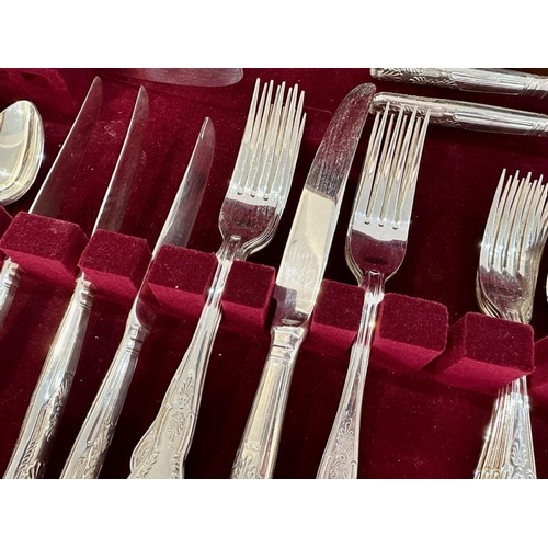 1056 - Viners Canteen of Cutlery, King's pattern, six piece setting in fitted mahogany case with red velvet... 