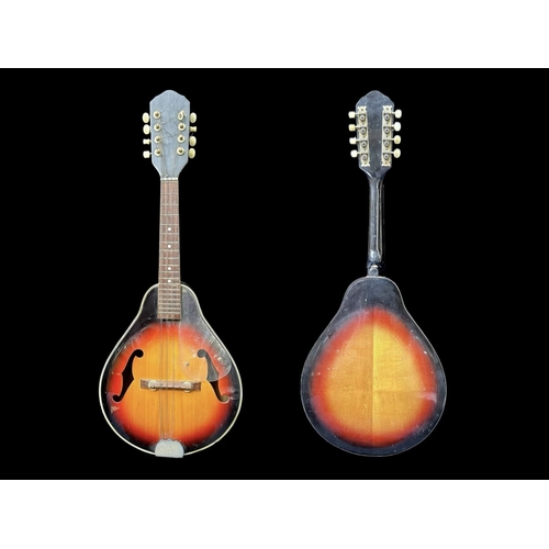 1107 - Mandolin, eight string, two piece. Length 27''.