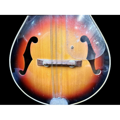 1107 - Mandolin, eight string, two piece. Length 27''.